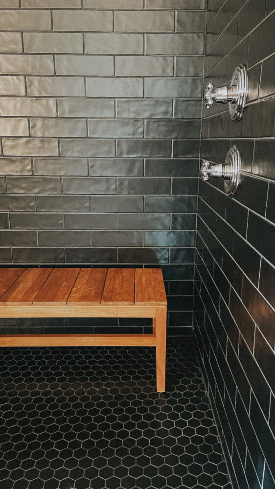 Black Tile Shower, Teak Bench + Shower Dispensers | Our Fifth House